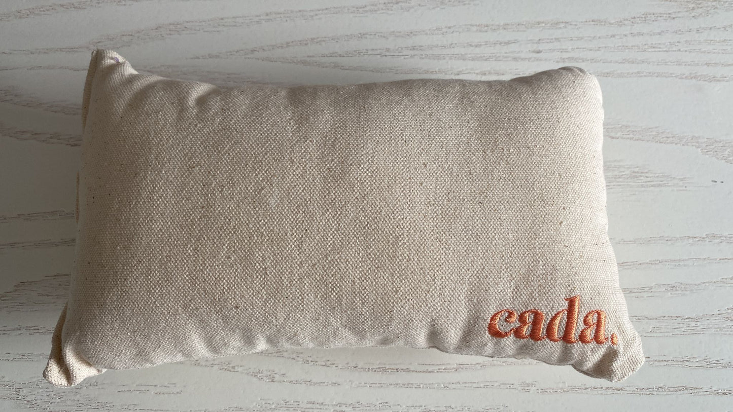 Almohada crudo con Naranja OPORTUNIDADES